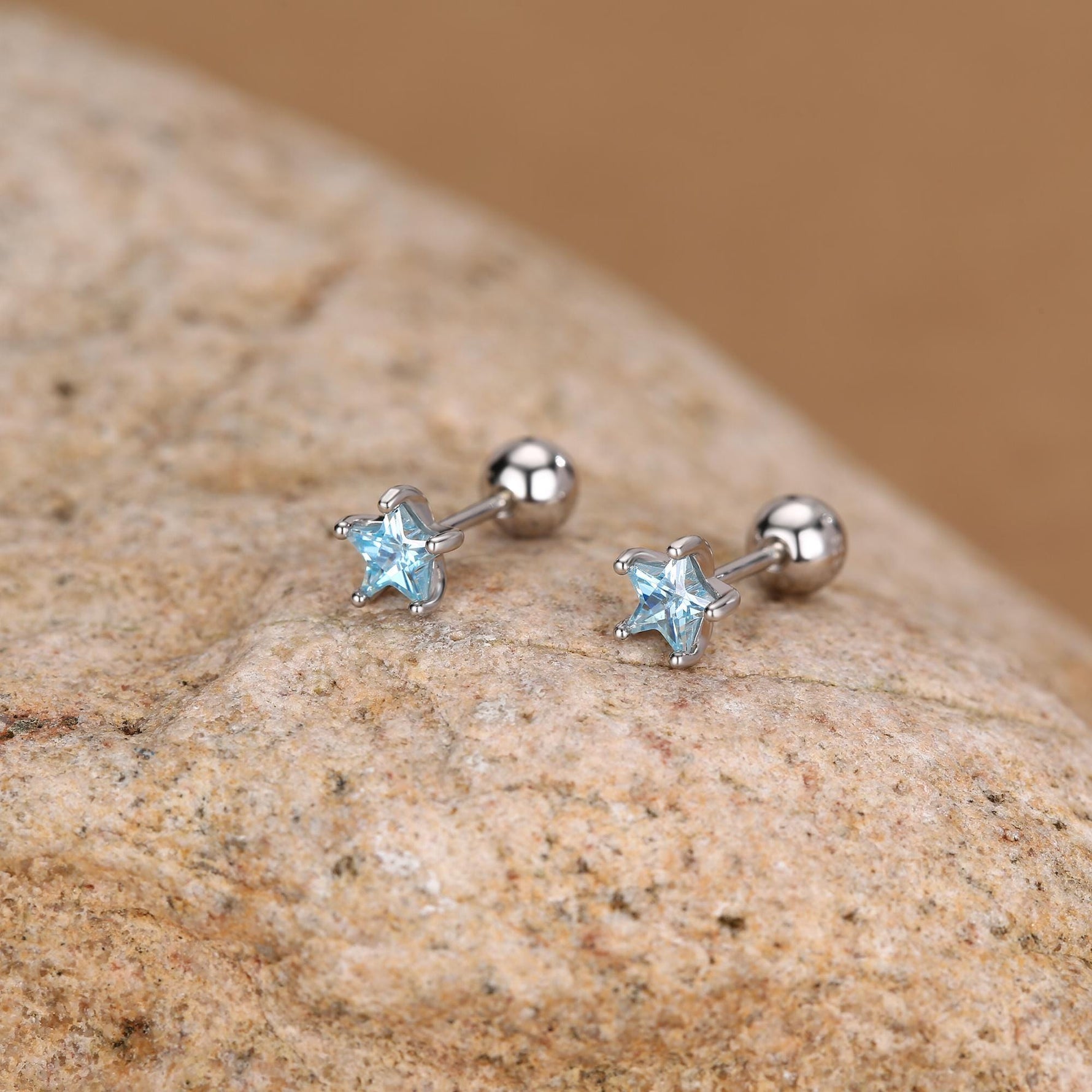 Sterling Silver Topaz Blue CZ Star 18G Screw Back Earrings