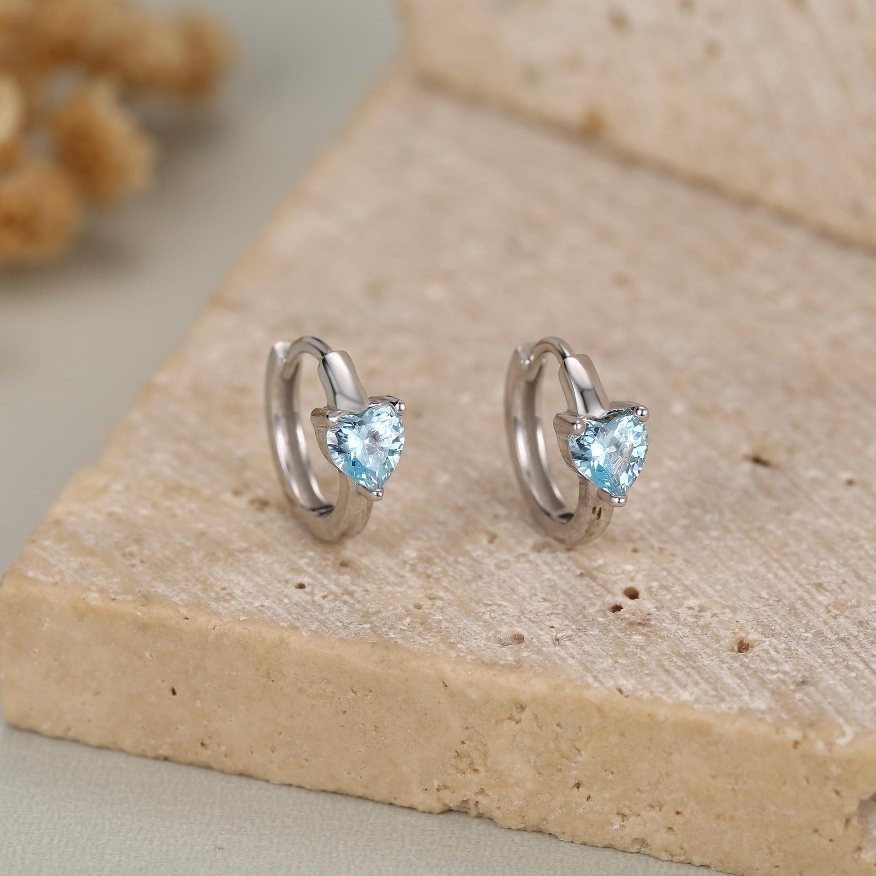 Sterling Silver Topaz Blue CZ Huggie Hoop Earrings