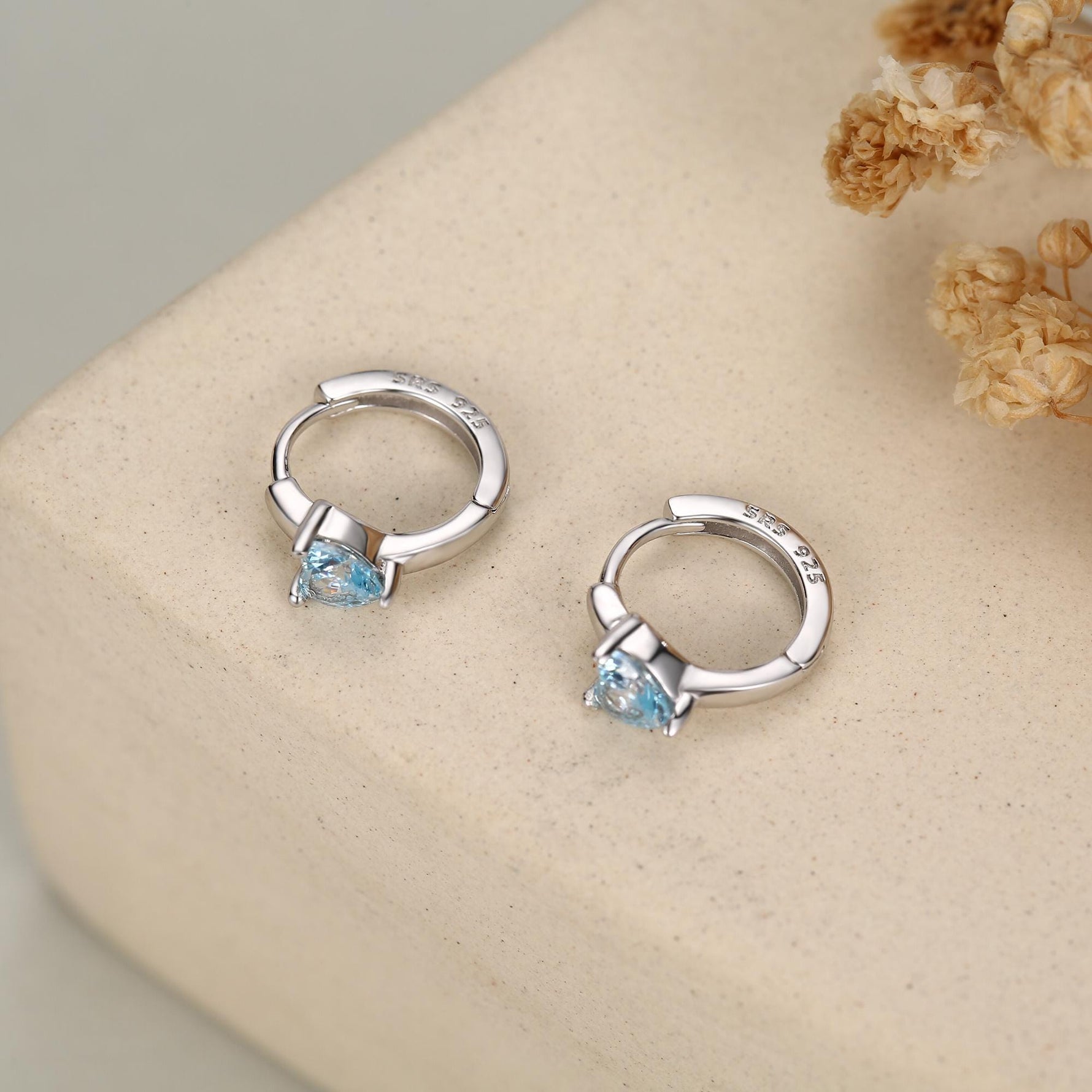 Sterling Silver Topaz Blue CZ Huggie Hoop Earrings