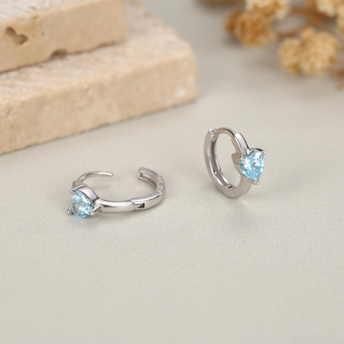 Sterling Silver Topaz Blue CZ Huggie Hoop Earrings