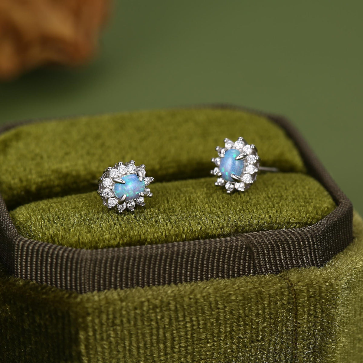 Blue Opal CZ Oval Halo Stud Earrings in Sterling Silver
