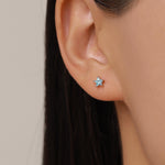 Sterling Silver 4mm Topaz Blue CZ Star Stud Earrings