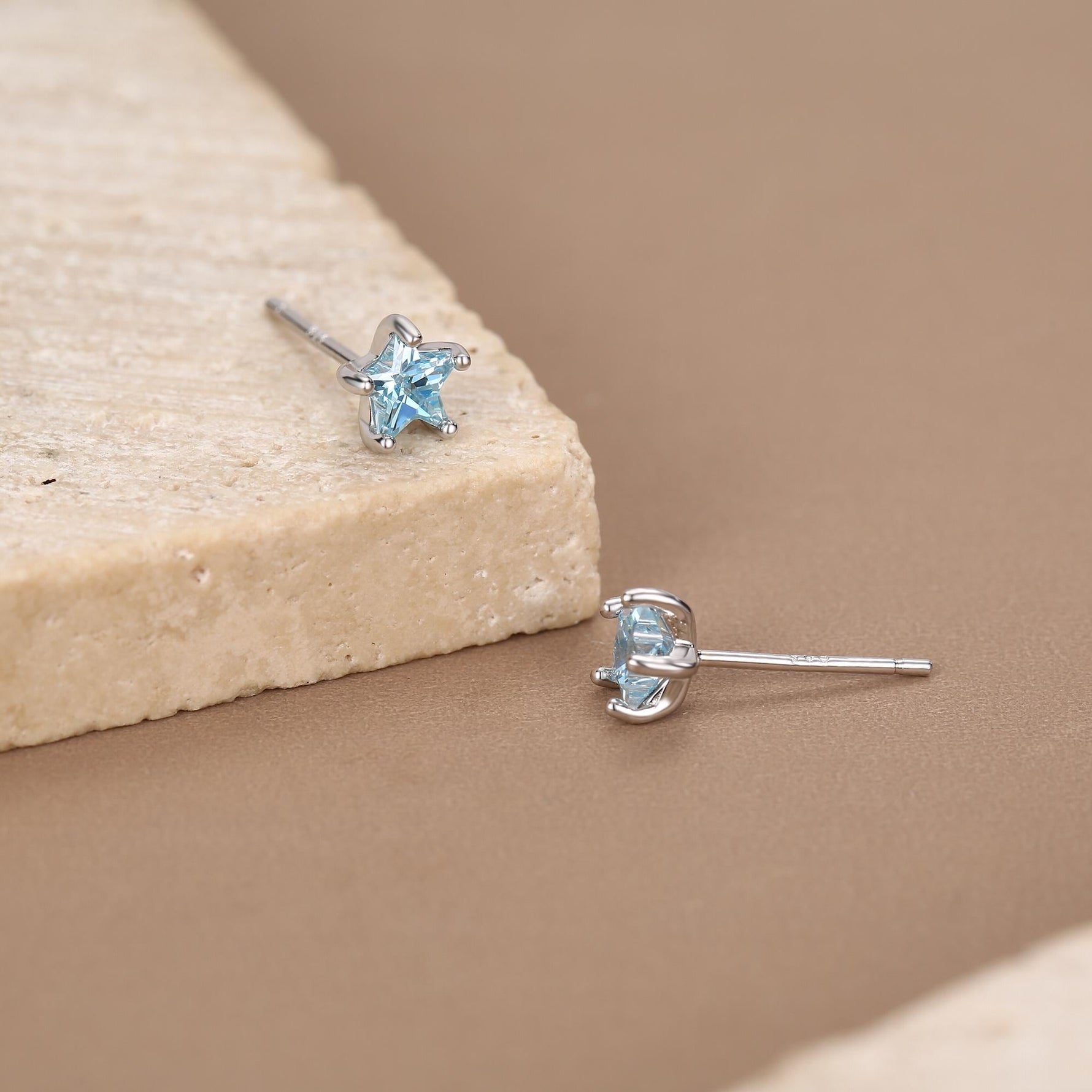 Sterling Silver 5mm Topaz Blue CZ Star Stud Earrings