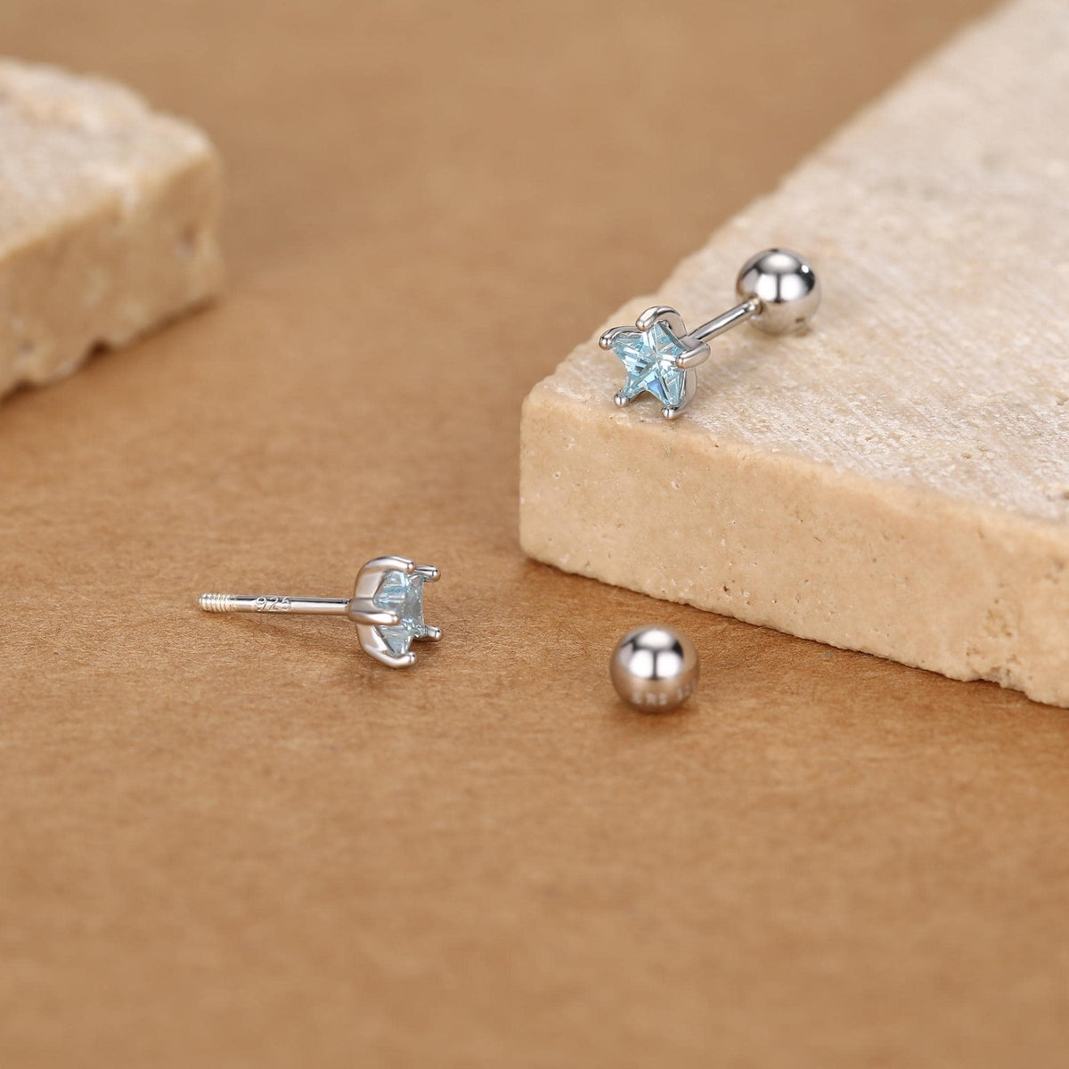 Sterling Silver Topaz Blue CZ Star 18G Screw Back Earrings