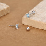 Sterling Silver Topaz Blue CZ Star 18G Screw Back Earrings