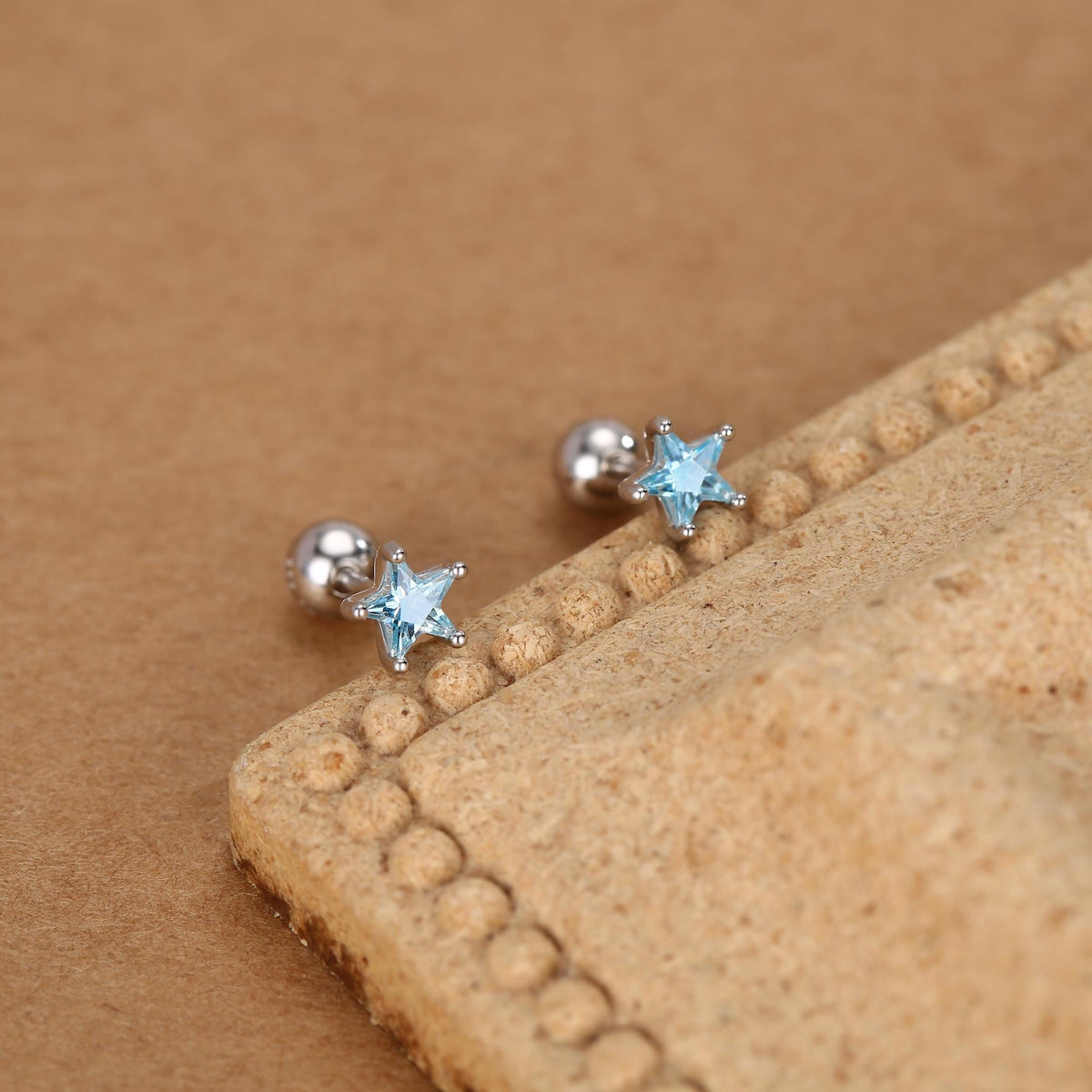 Sterling Silver Topaz Blue CZ Star 18G Screw Back Earrings