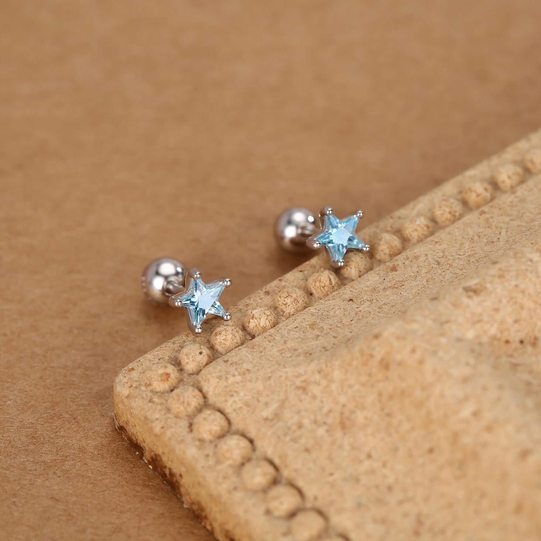 Sterling Silver Topaz Blue CZ Star 18G Screw Back Earrings