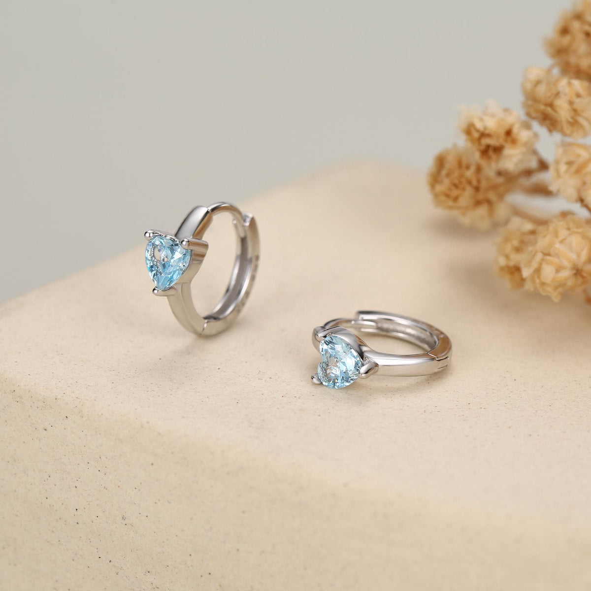 Sterling Silver Topaz Blue CZ Huggie Hoop Earrings
