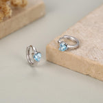 Sterling Silver Topaz Blue CZ Huggie Hoop Earrings