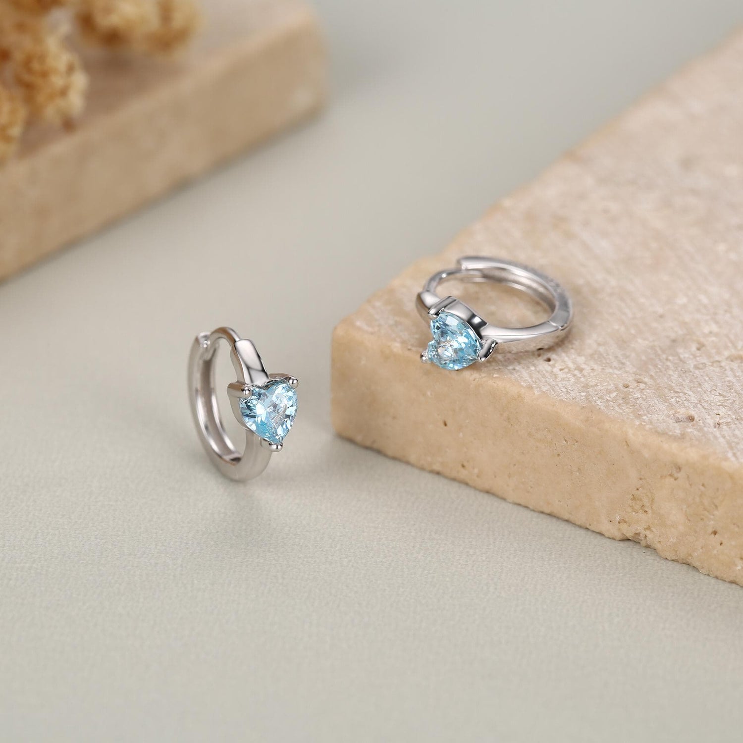 Sterling Silver Topaz Blue CZ Huggie Hoop Earrings