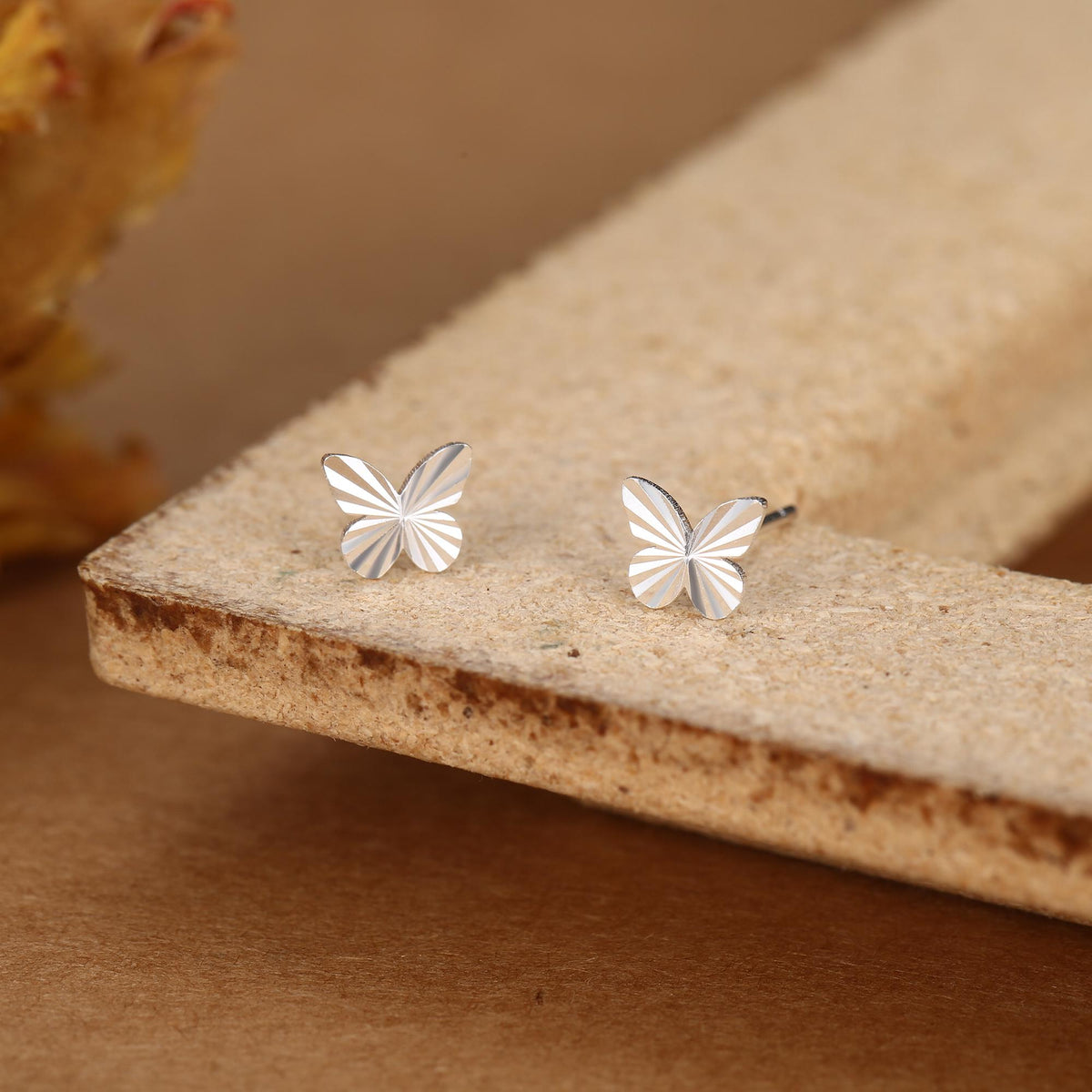 Sterling Silver Diamond Cut Sunburst Butterfly Stud Earrings