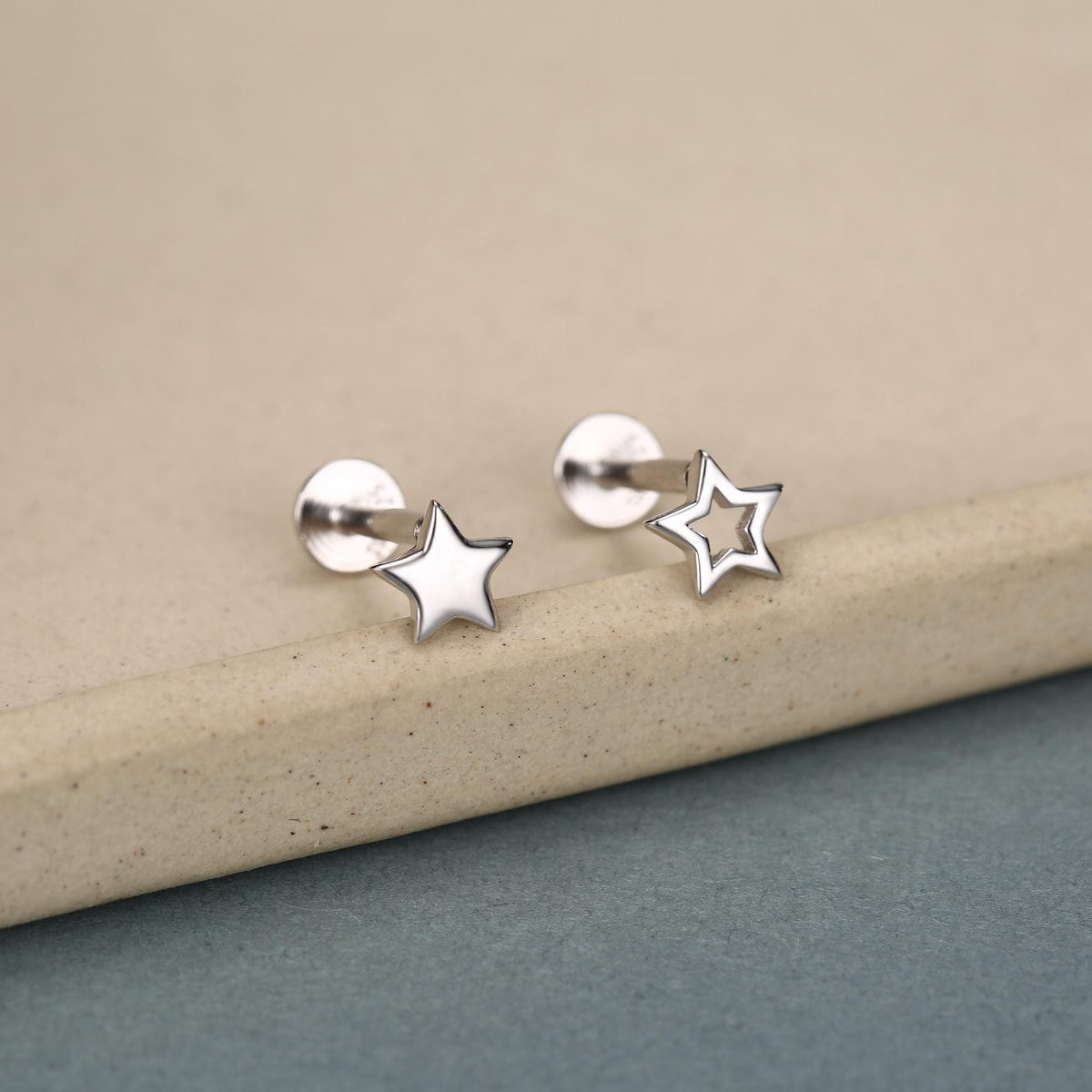 Sterling Silver Solid and Cutout Star 16G Flat Back Earrings