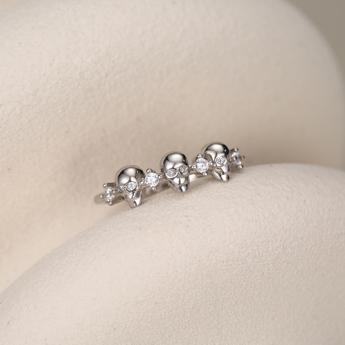 Triple Skull Motif Ring with Clear CZ