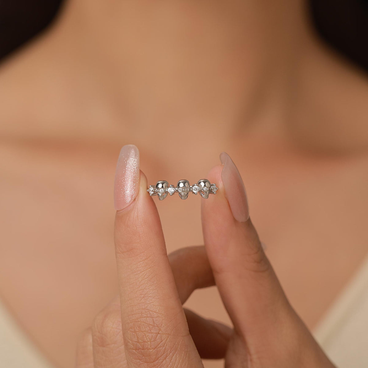 Triple Skull Motif Ring with Clear CZ