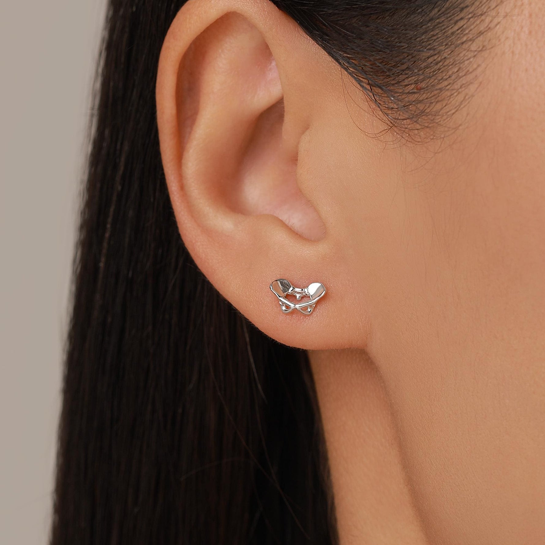 Sterling Silver Mismatched Ribcage and Pelvis Stud Earrings