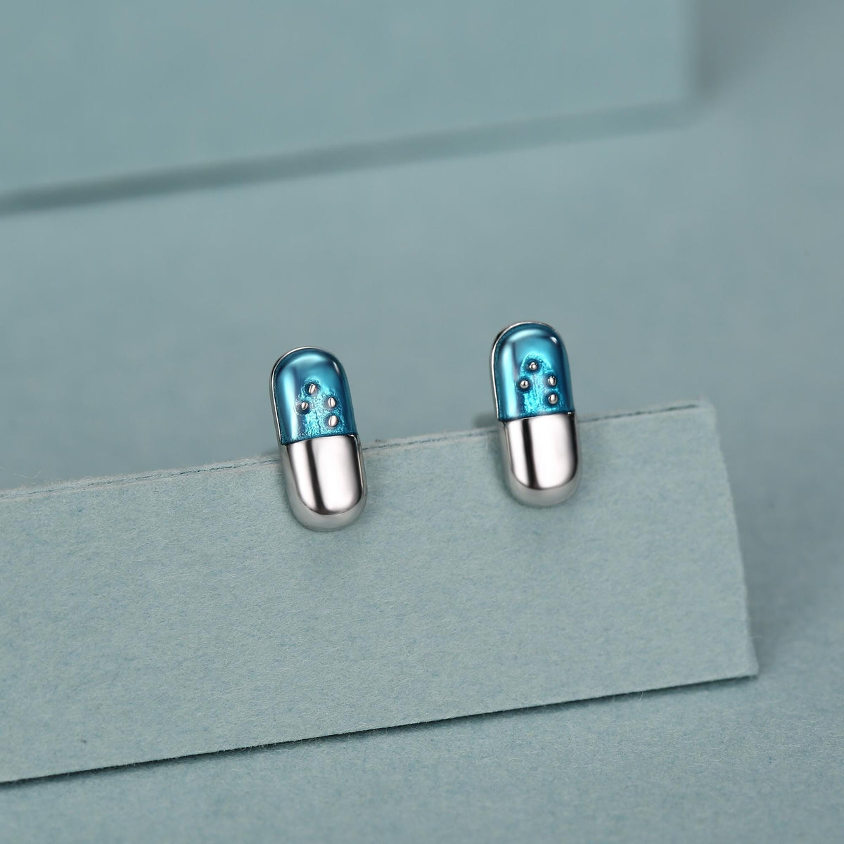 Sterling Silver Blue Pill Mismatched Stud Earrings
