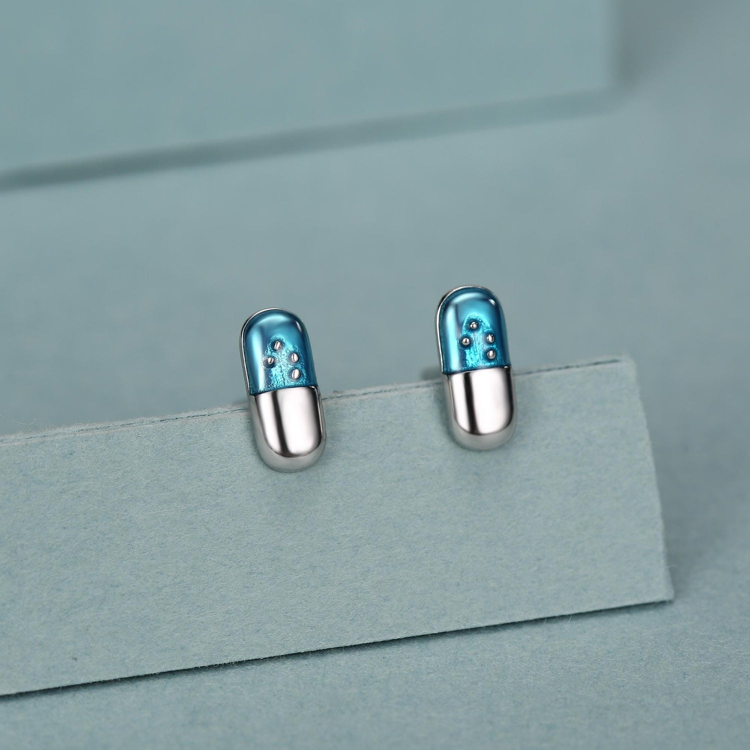 Sterling Silver Blue Pill Mismatched Stud Earrings