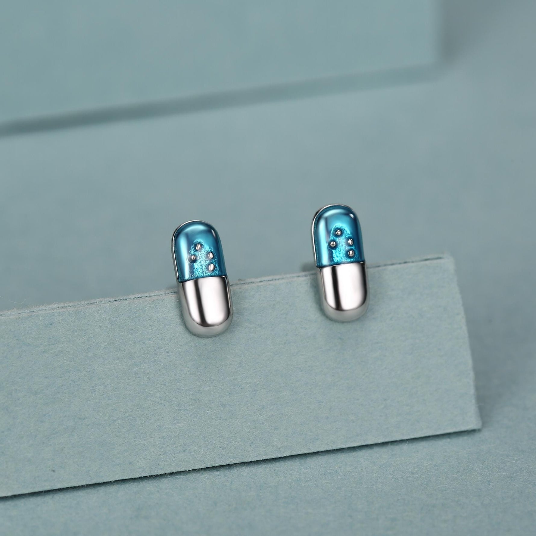 Sterling Silver Blue Pill Mismatched Stud Earrings