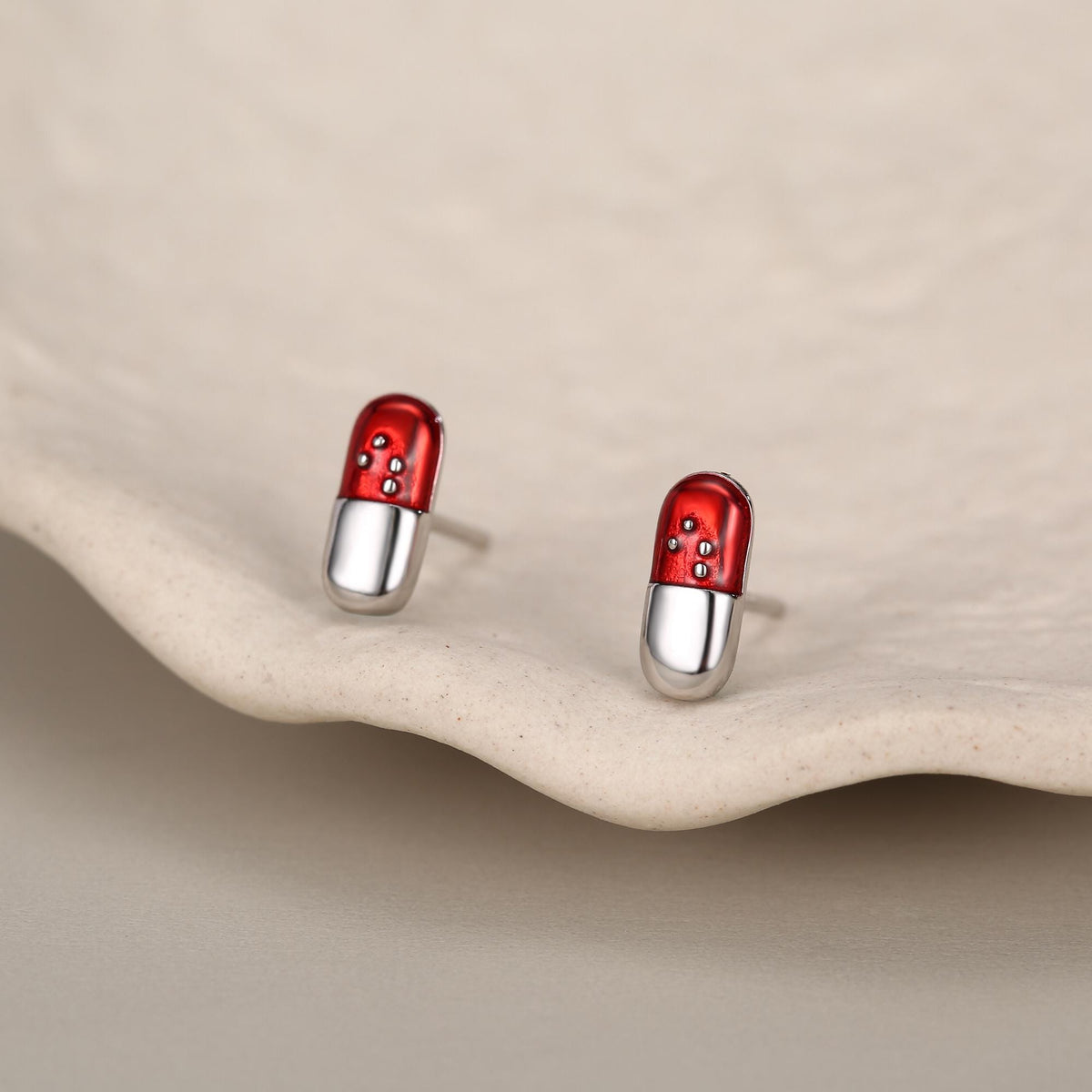 Sterling Silver Red Pill Mismatched Stud Earrings