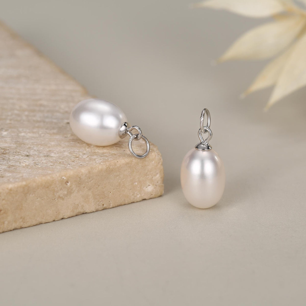 Natural Oval Freshwater Pearl Hoop Earrings in Sterling Silver