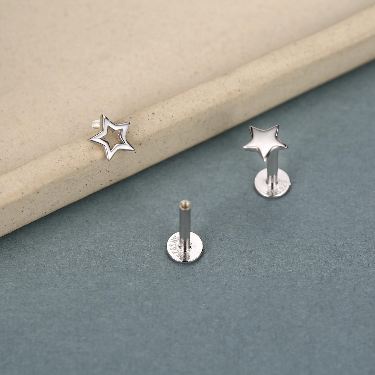Sterling Silver Solid and Cutout Star 16G Flat Back Earrings