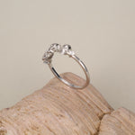 Triple Skull Motif Ring with Clear CZ