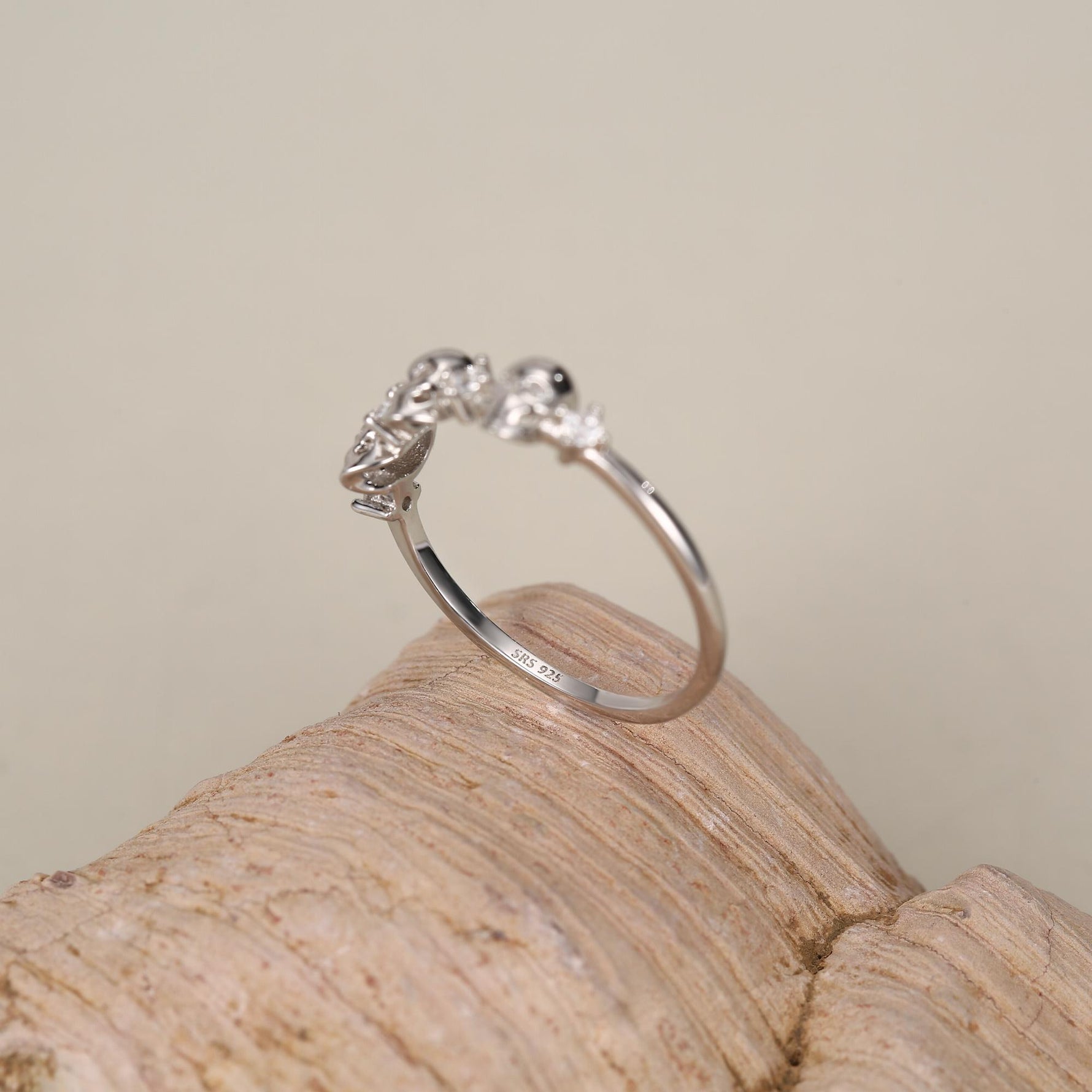 Triple Skull Motif Ring with Clear CZ