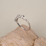 Triple Skull Motif Ring with Clear CZ