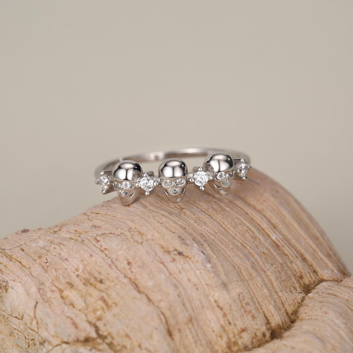 Triple Skull Motif Ring with Clear CZ