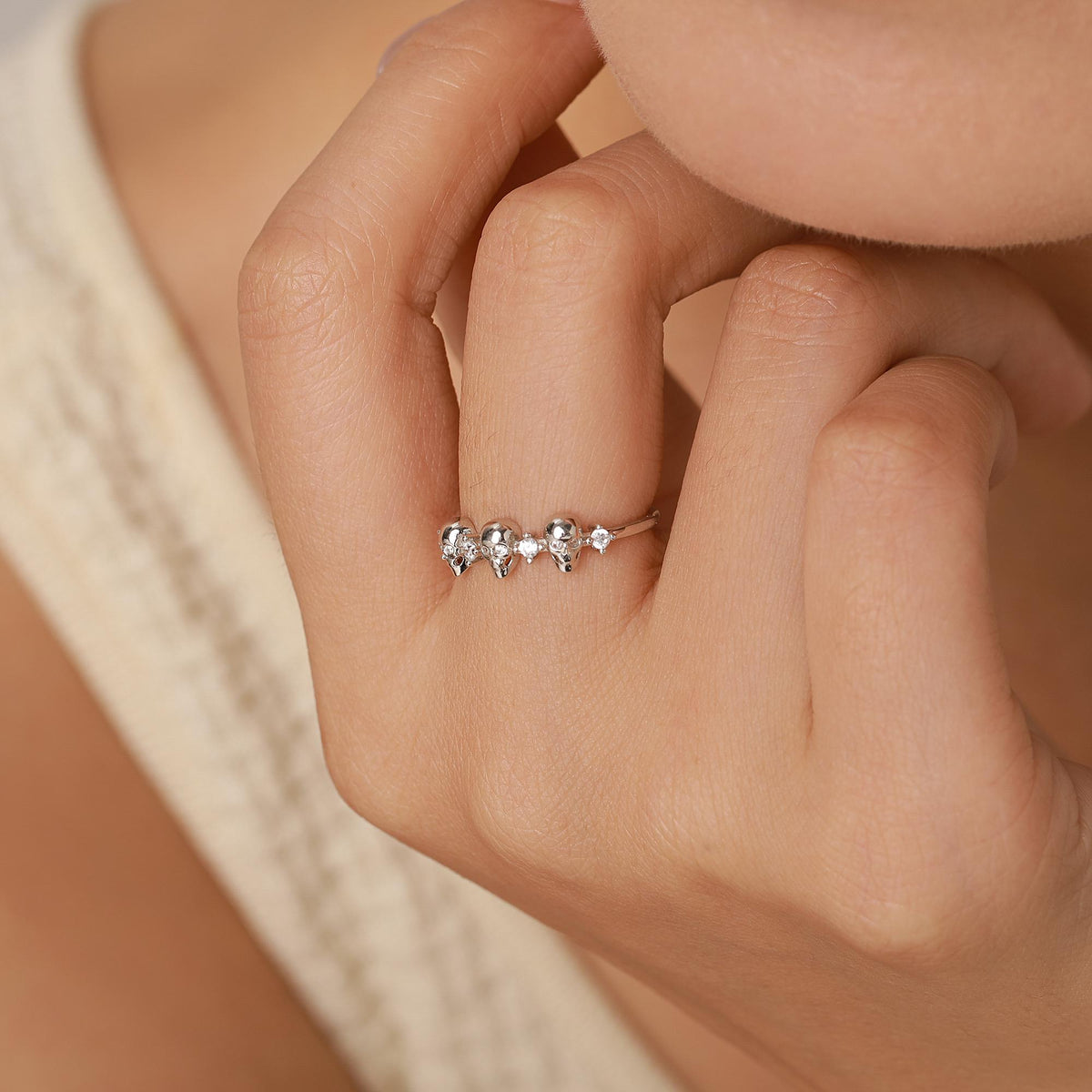 Triple Skull Motif Ring with Clear CZ