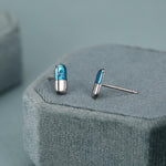 Sterling Silver Blue Pill Mismatched Stud Earrings