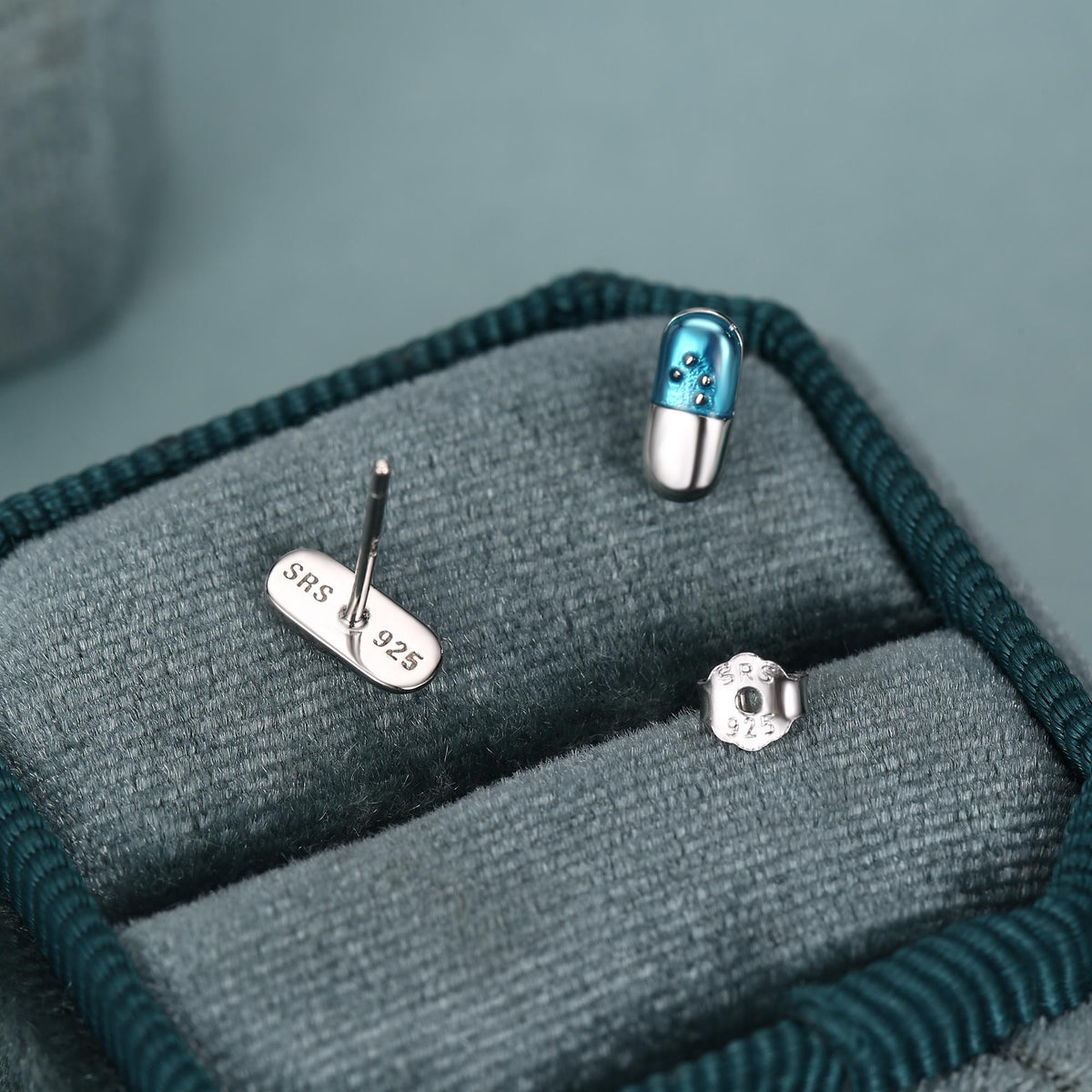Sterling Silver Blue Pill Mismatched Stud Earrings