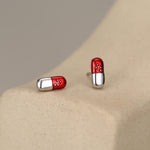 Sterling Silver Red Pill Mismatched Stud Earrings