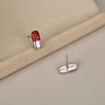 Sterling Silver Red Pill Mismatched Stud Earrings