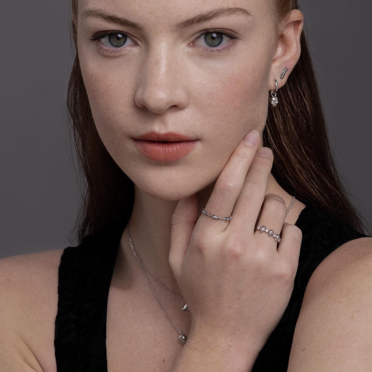 Triple Skull Motif Ring with Clear CZ