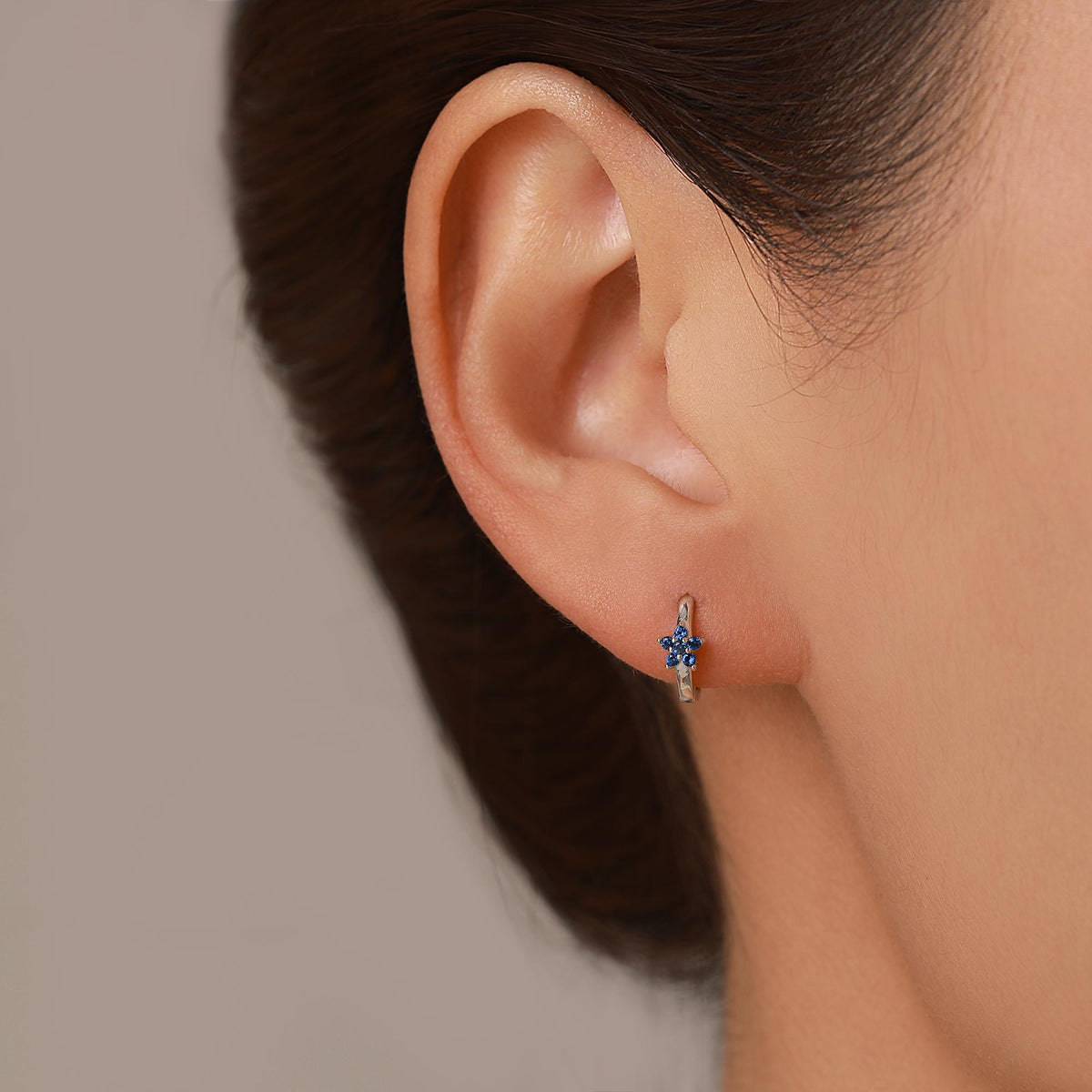Tiny Sapphire Blue CZ Flower Huggie Hoops, CZ Hoop Earrings, Crystal Flower Huggie Earrings, September Birthstone