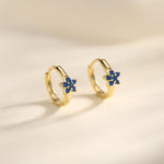 Tiny Sapphire Blue CZ Flower Huggie Hoops, CZ Hoop Earrings, Crystal Flower Huggie Earrings, September Birthstone