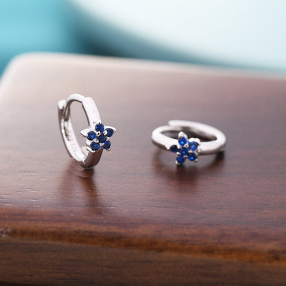 Tiny Sapphire Blue CZ Flower Huggie Hoops, CZ Hoop Earrings, Crystal Flower Huggie Earrings, September Birthstone