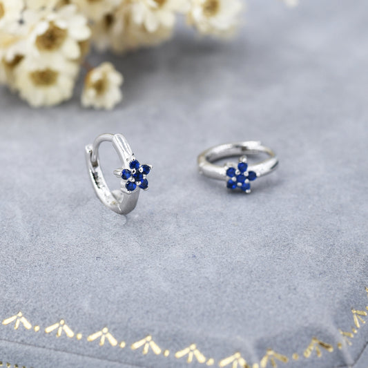Tiny Sapphire Blue CZ Flower Huggie Hoops, CZ Hoop Earrings, Crystal Flower Huggie Earrings, September Birthstone